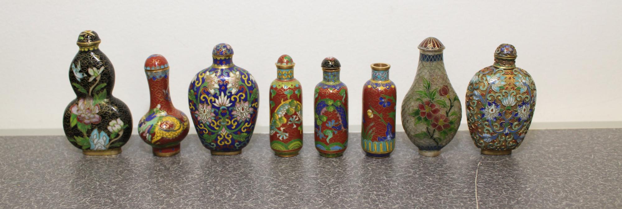 Eight Cloisonne Snuff Bottles Height of tallest 3 inches.