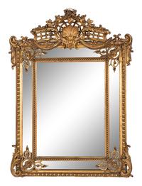 A Rococo Style Giltwood Mirror