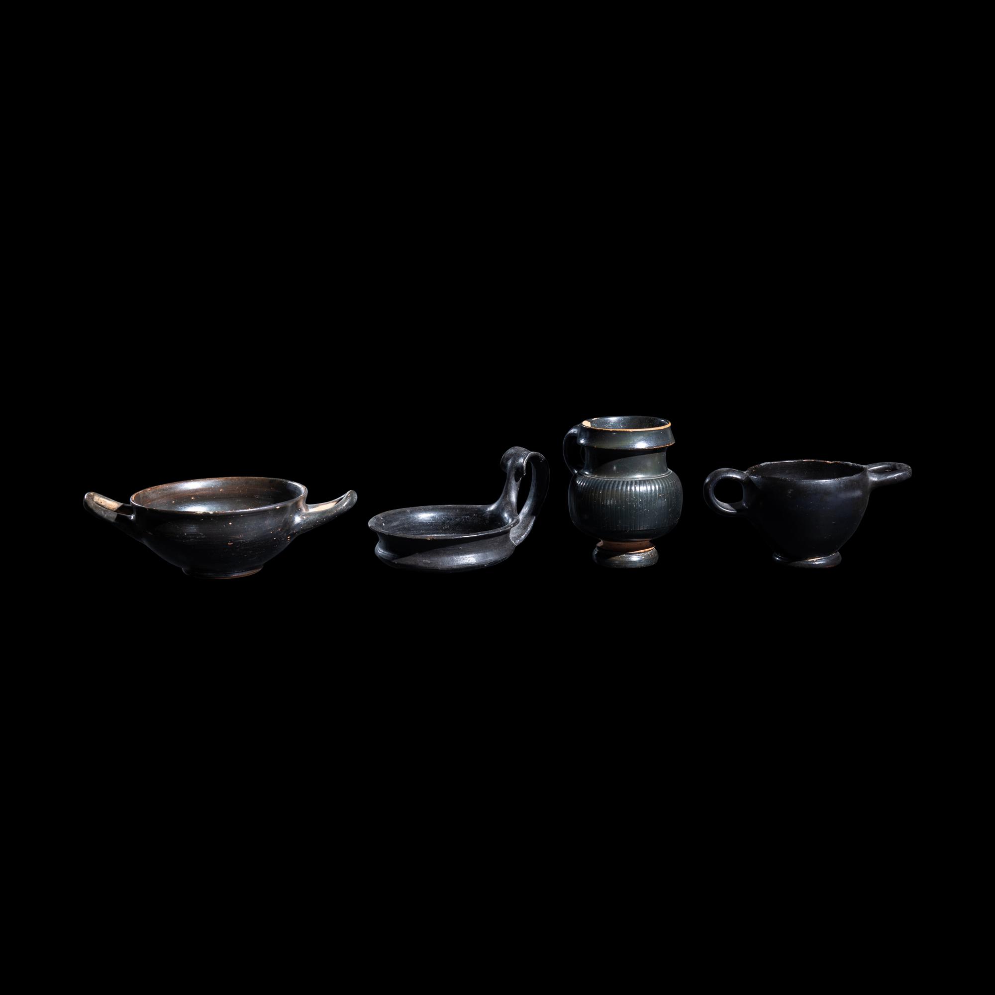 A Group of 7 Greek Black-Glazed Vessels