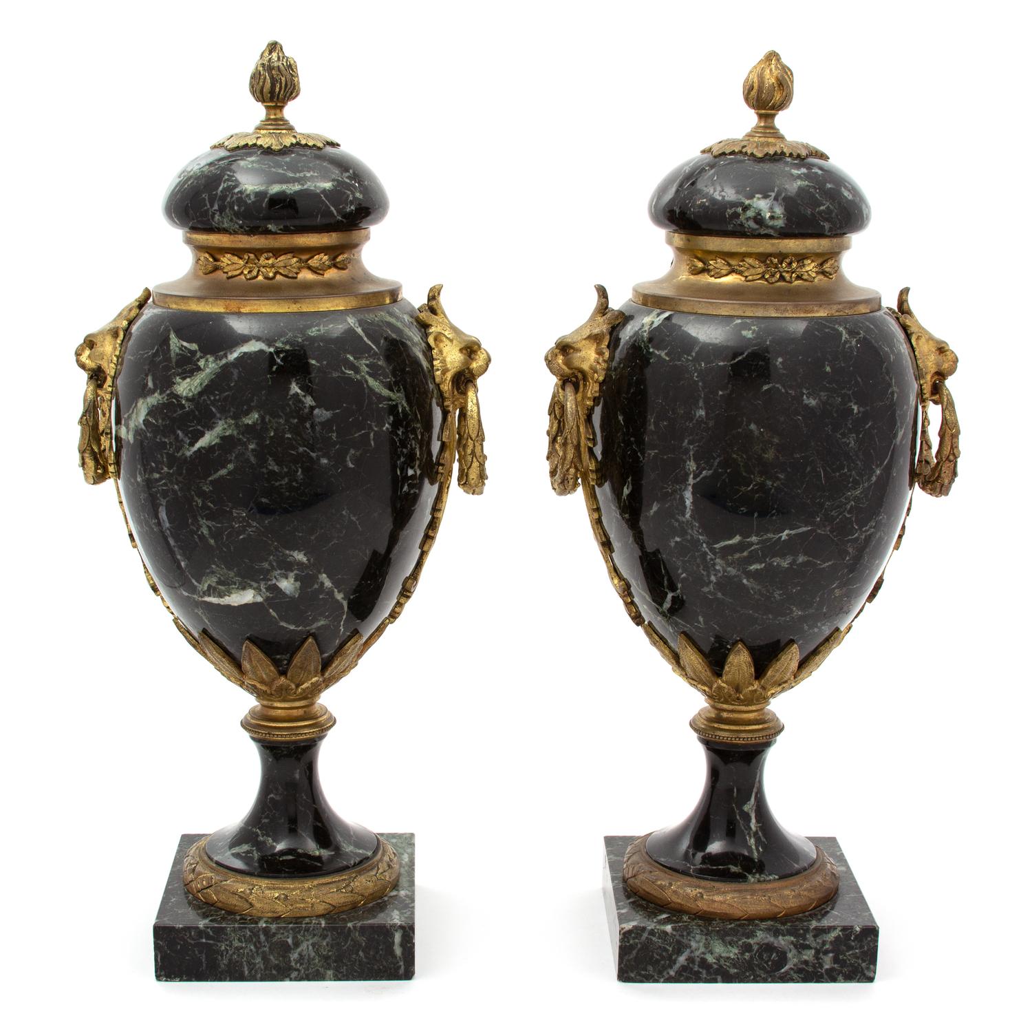 A Pair of French Black Marble Urns with Gilt Metal Mounts Height 16 1/2 x diameter 6 inches. — EARLY 20TH CENTURY