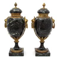 A Pair of French Black Marble Urns with Gilt Metal Mounts Height 16 1/2 x diameter 6 inches. — EARLY 20TH CENTURY