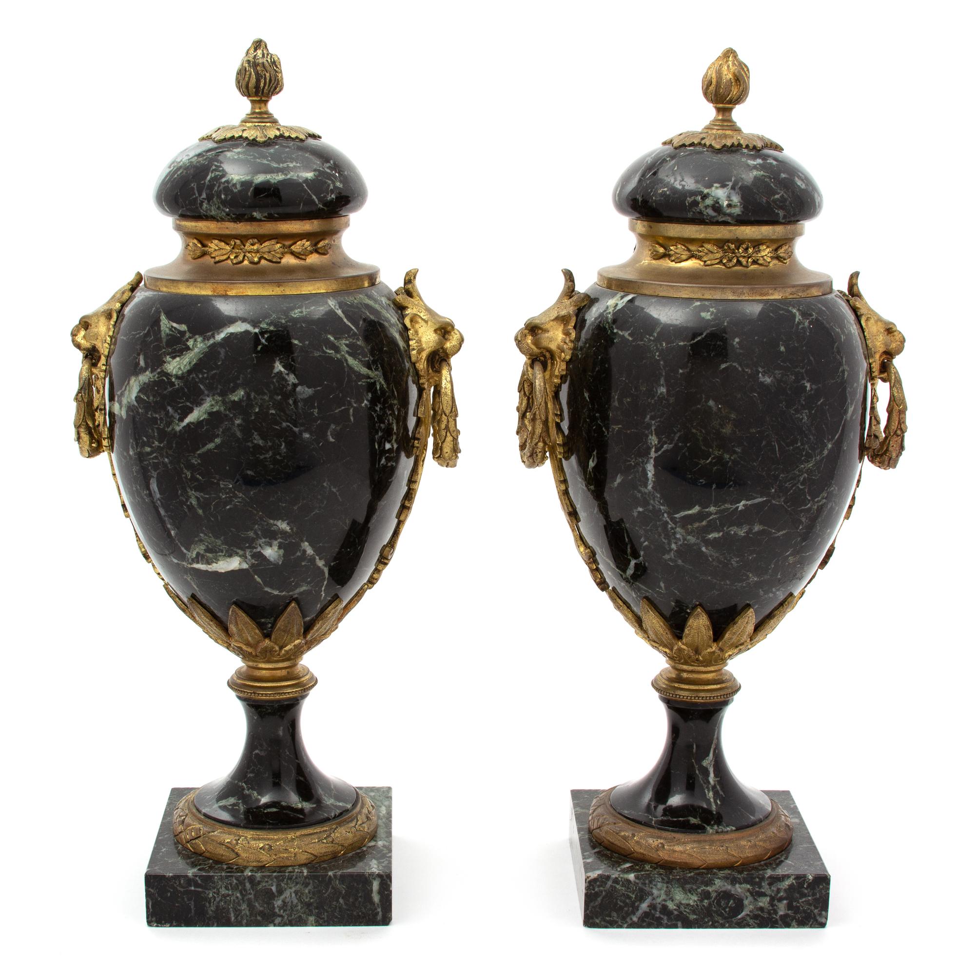 A Pair of French Black Marble Urns with Gilt Metal Mounts Height 16 1/2 x diameter 6 inches. — EARLY 20TH CENTURY
