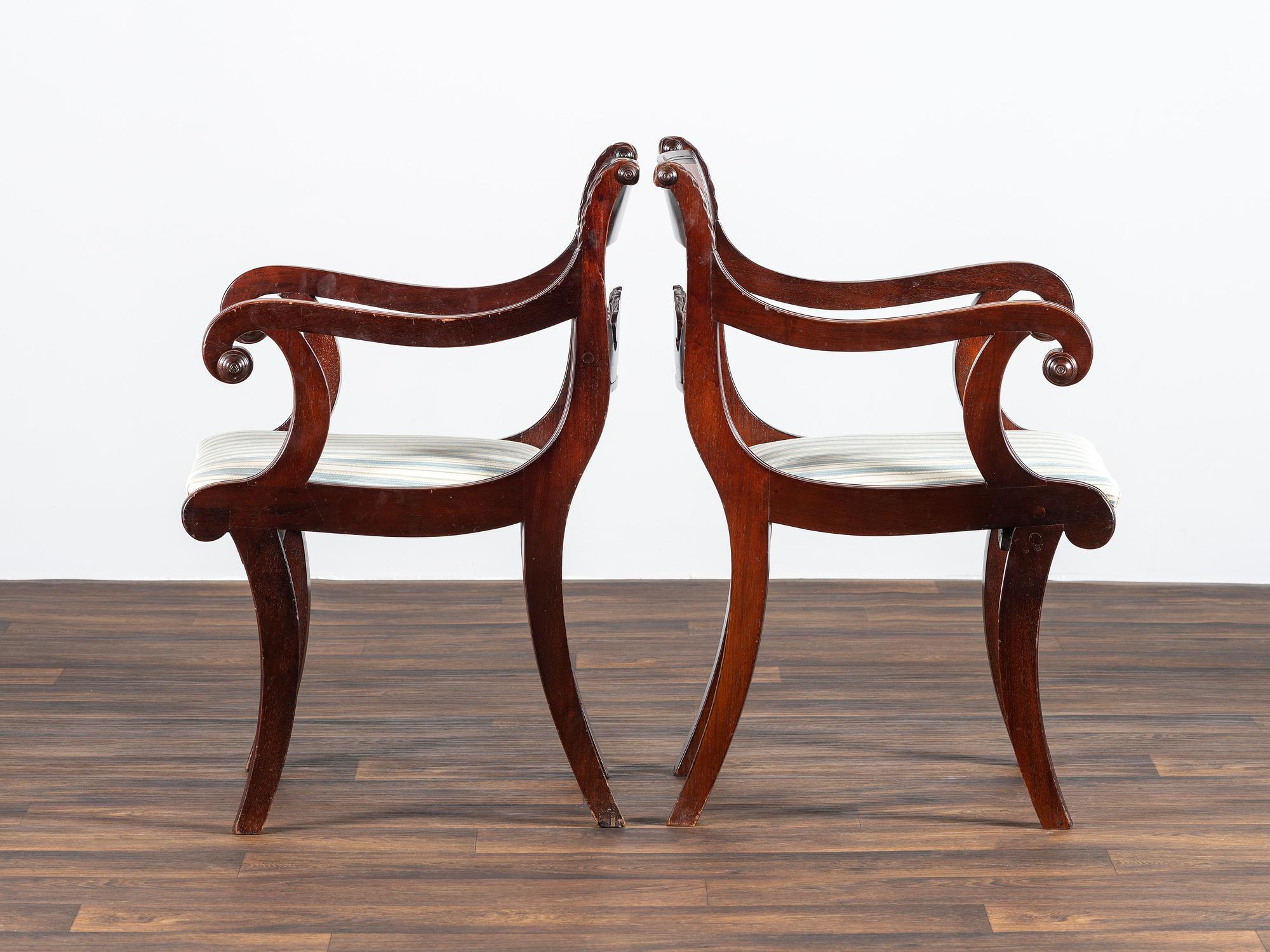 A Pair of Classical Cornucopia Carved Mahogany Armchairs