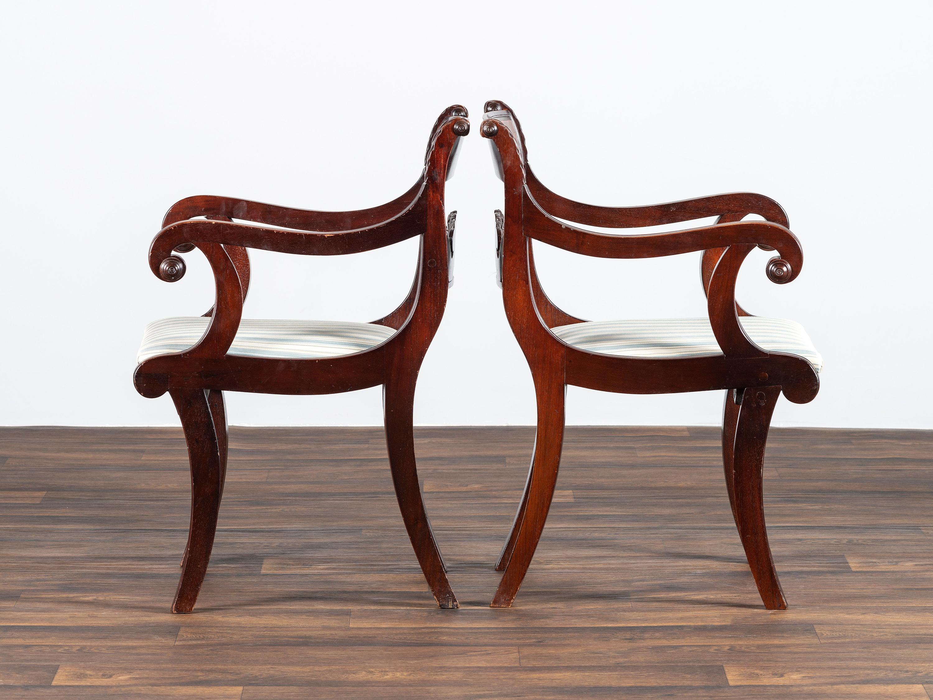 A Pair of Classical Cornucopia Carved Mahogany Armchairs