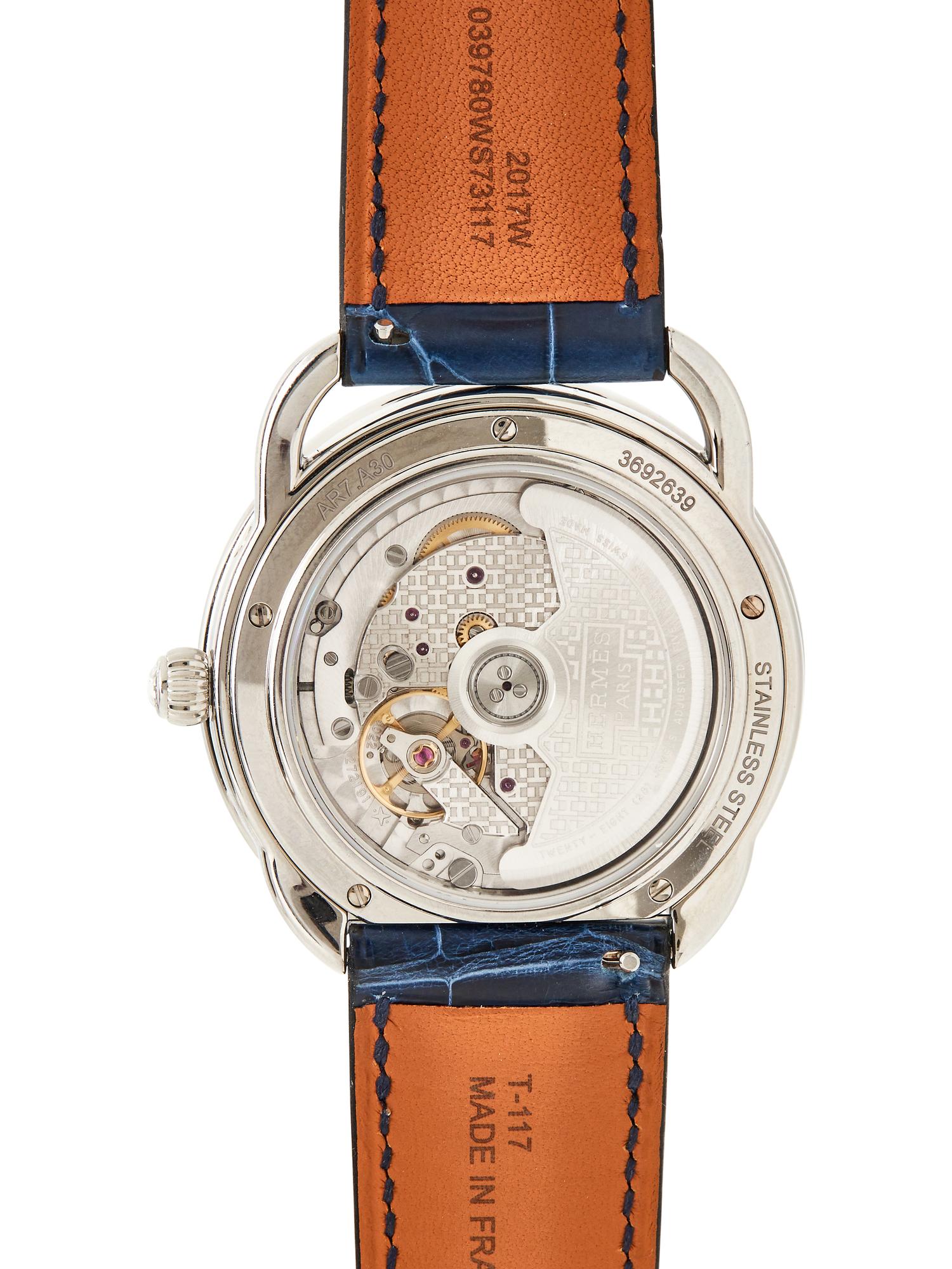 HERMÈS, REF. AR7.130 STAINLESS STEEL, DIAMOND, AND SAPPHIRE 'ARCEAU PETITE LUNE' MOONPHASE DATE WATCH
