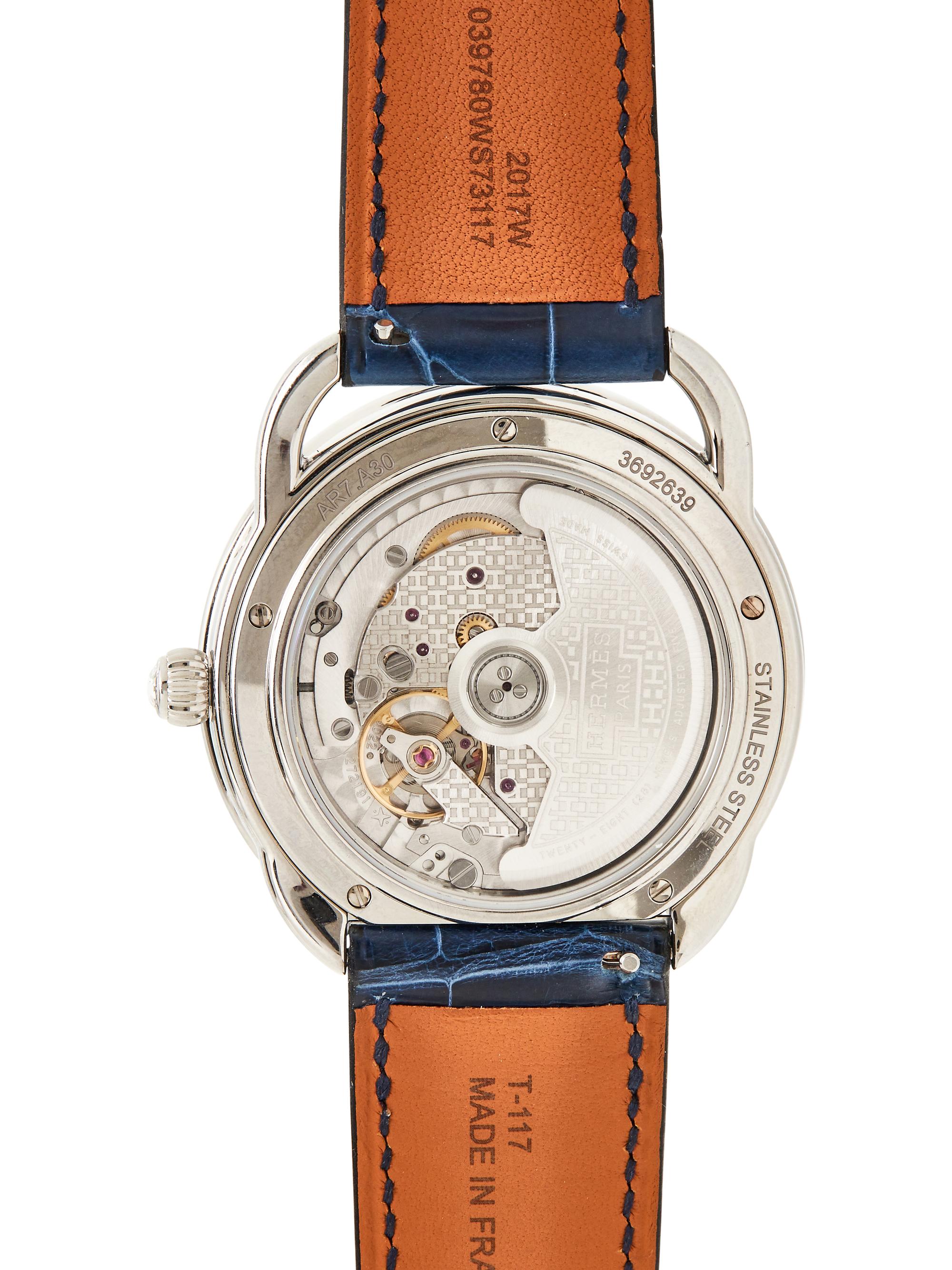 HERMÈS, REF. AR7.130 STAINLESS STEEL, DIAMOND, AND SAPPHIRE 'ARCEAU PETITE LUNE' MOONPHASE DATE WATCH