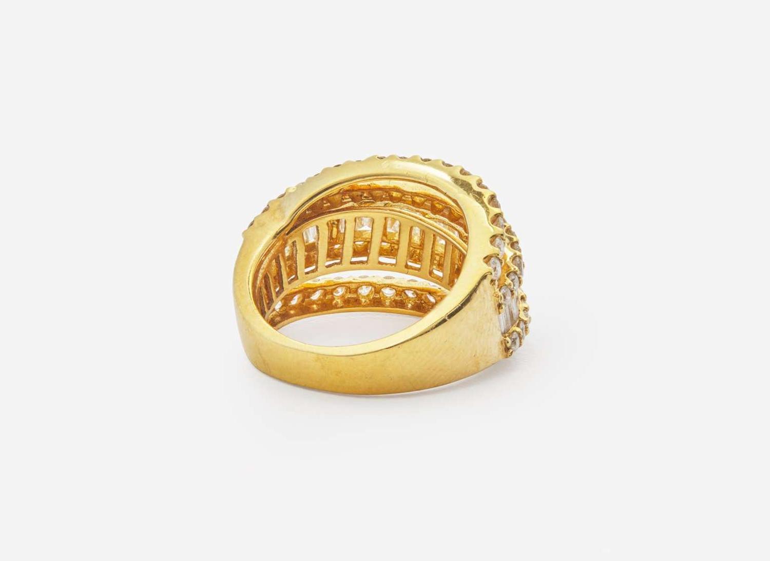 A Ladies 18K Yellow Gold and Diamond Ring