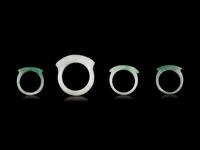 Four Chinese Jadeite Saddle Rings