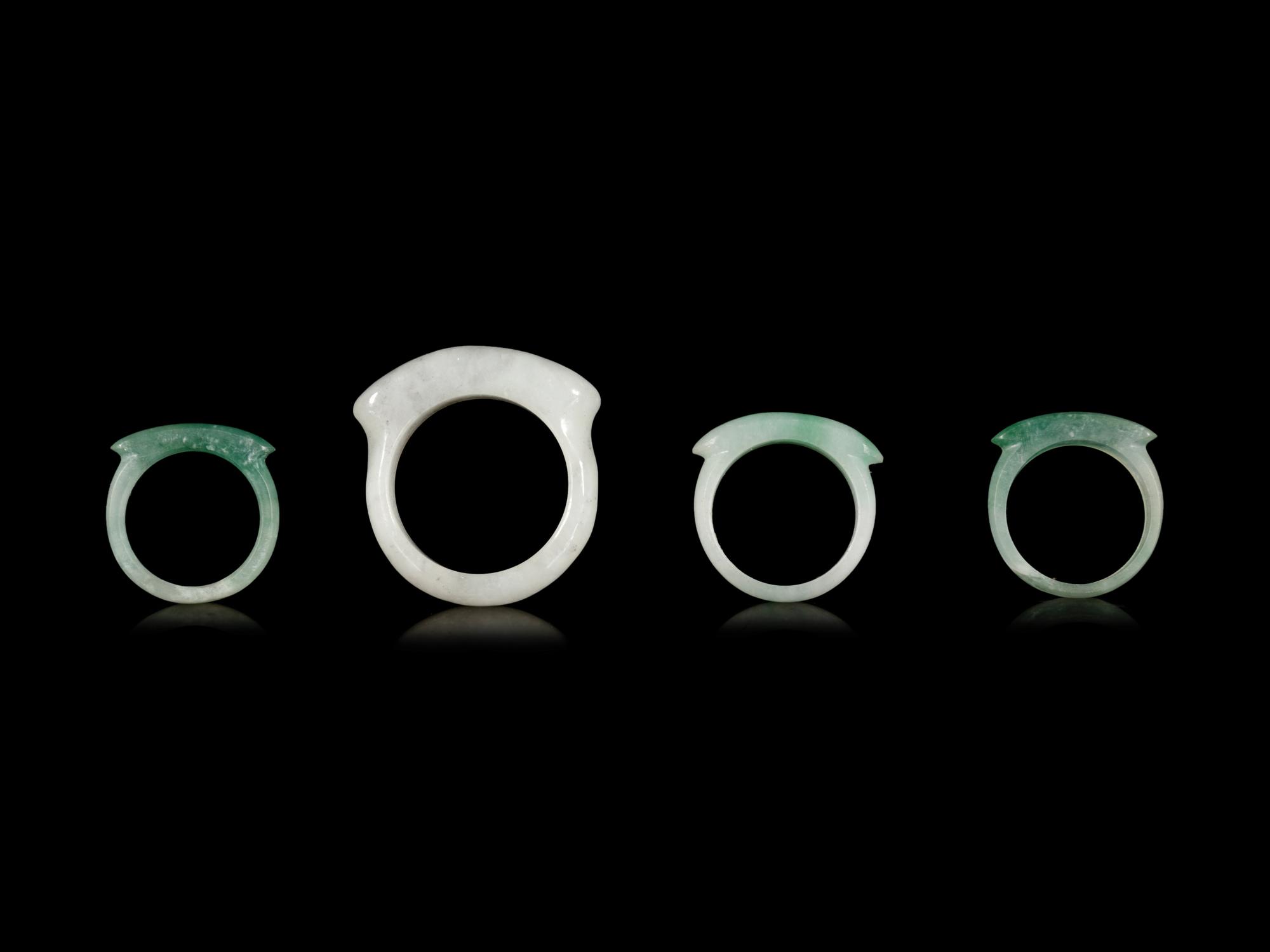 Four Chinese Jadeite Saddle Rings