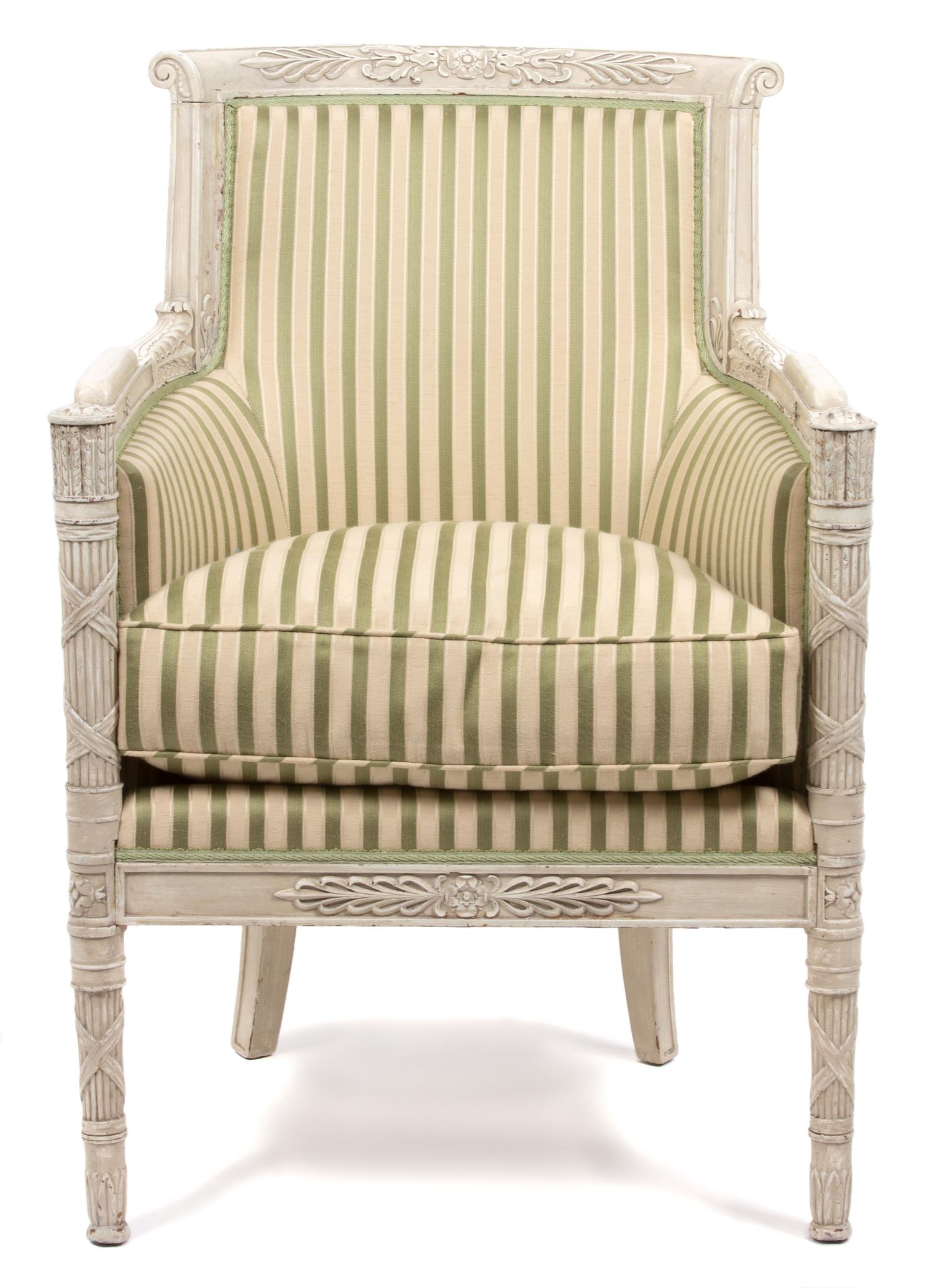 A Louis XVI Style Carved and Painted Bergere Height 27 x width 25 1/2 x depth 24 inches. — 19TH CENTURY