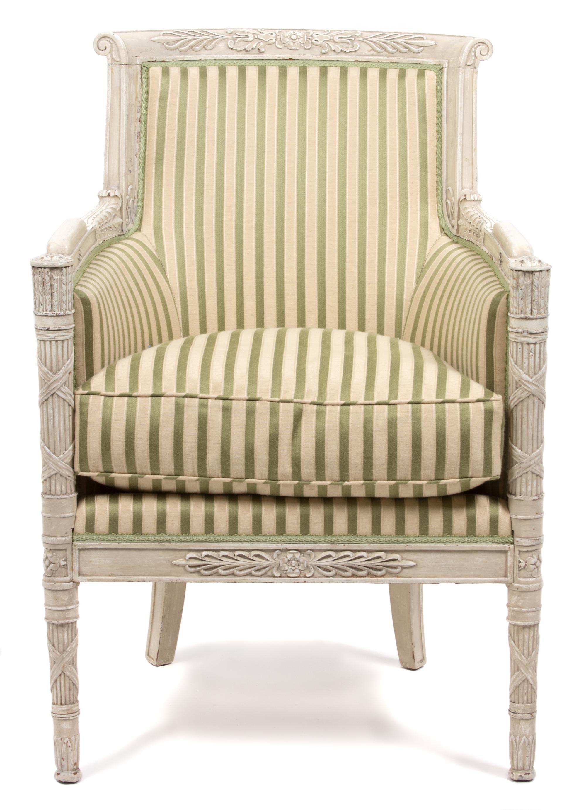 A Louis XVI Style Carved and Painted Bergere Height 27 x width 25 1/2 x depth 24 inches. — 19TH CENTURY