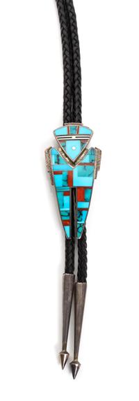 A Navajo Silver and Turquoise Bolo, Ray Tracey Height 3 3/8 x width 1 5/8 inches.