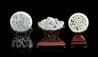 Three Pale Celadon Jade Reticulated Plaques Diameter of largest 2 3/8 inches. — 19TH CENTURY