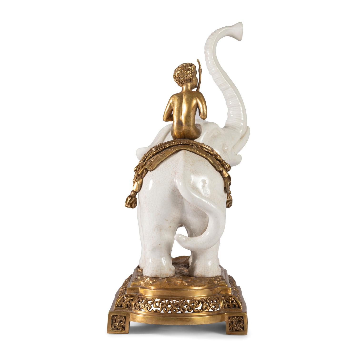 A Brass and Earthenware Elephant Figure