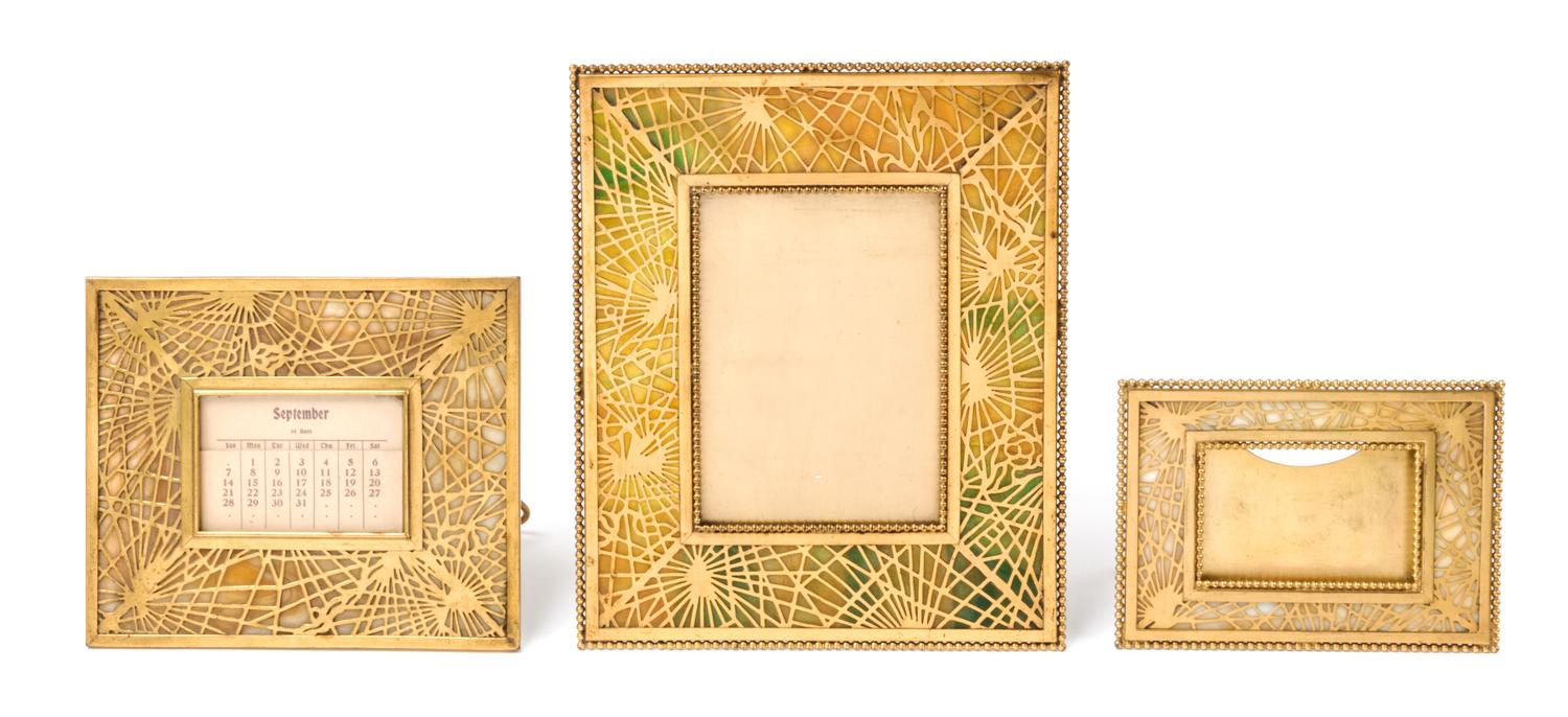 Tiffany Studios, EARLY 20TH CENTURY, a group of three Pine Needle pattern frames (940, 941, 947)