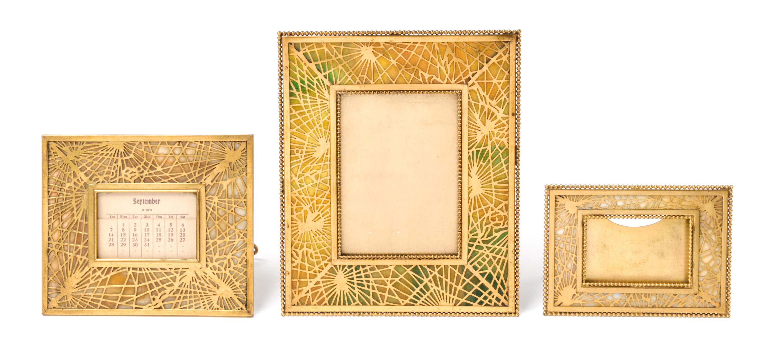 Tiffany Studios, EARLY 20TH CENTURY, a group of three Pine Needle pattern frames (940, 941, 947)