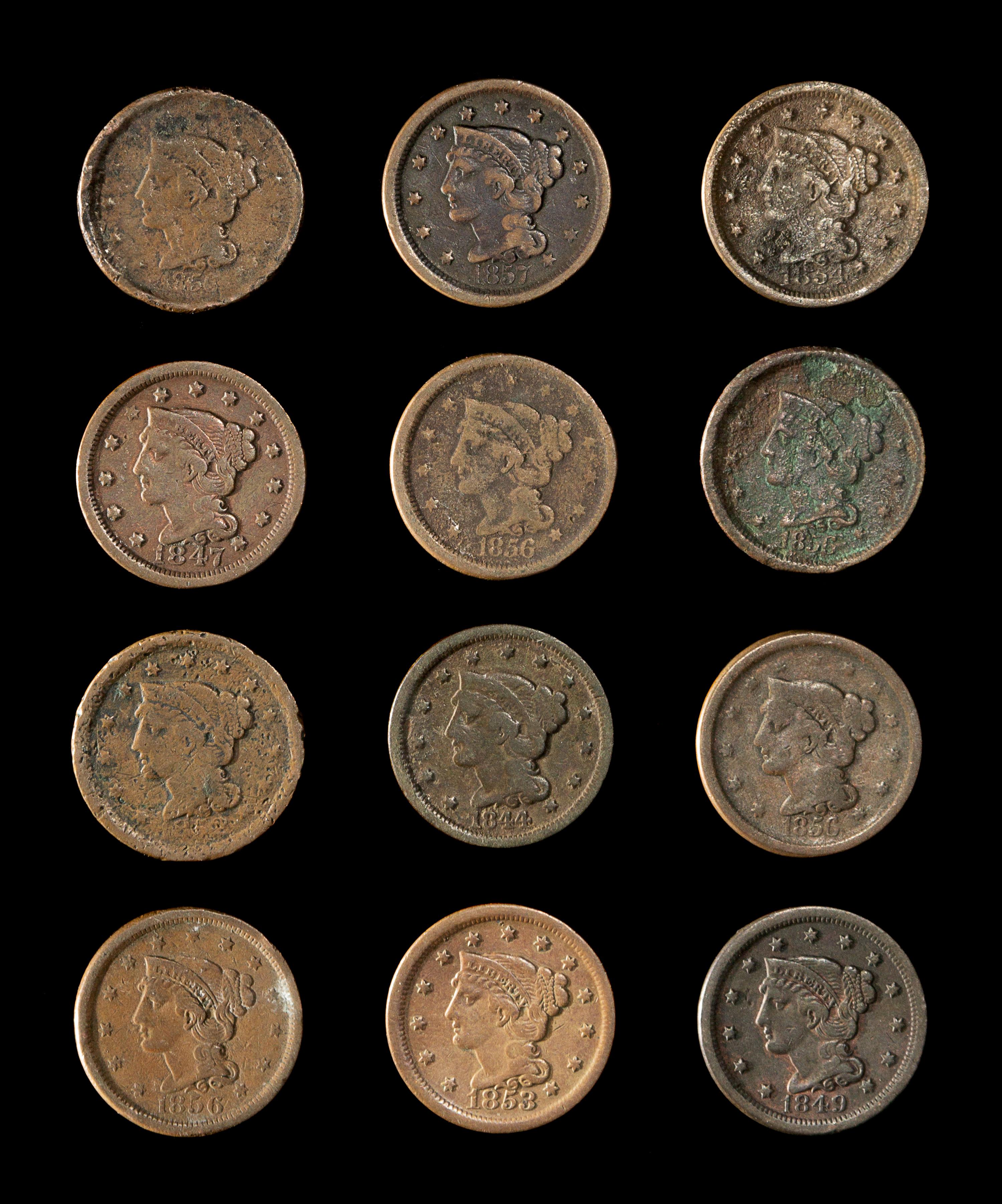 A Collection of Twelve United States Braided Hair 1c Coins