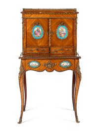 A Napoleon III Kingwood, Gilt Bronze Mounted and Porcelain Inset Bonheur du Jour