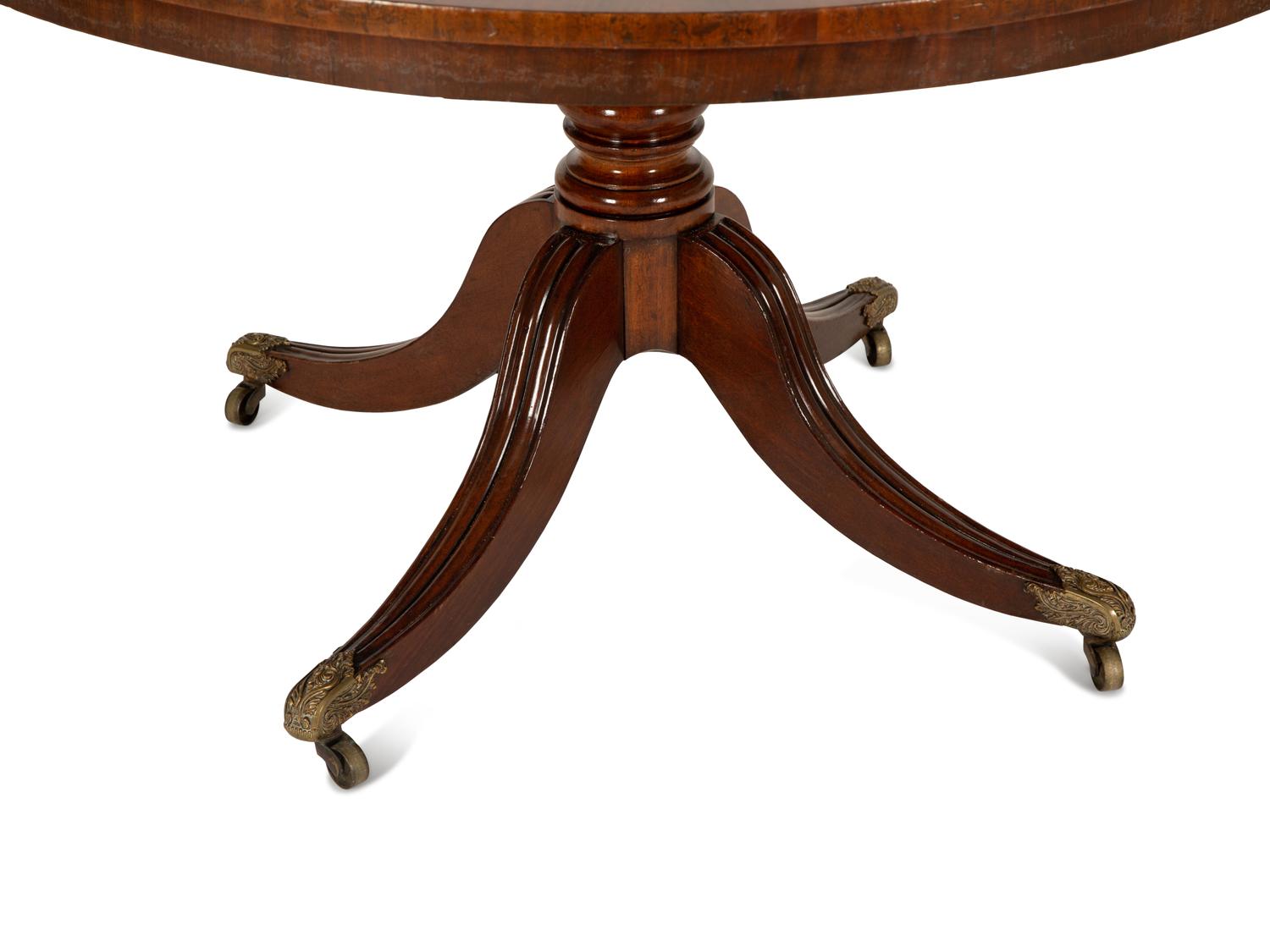 A Regency Figured Mahogany Crossbanded Center Table — 19th Century