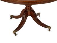A Regency Figured Mahogany Crossbanded Center Table — 19th Century