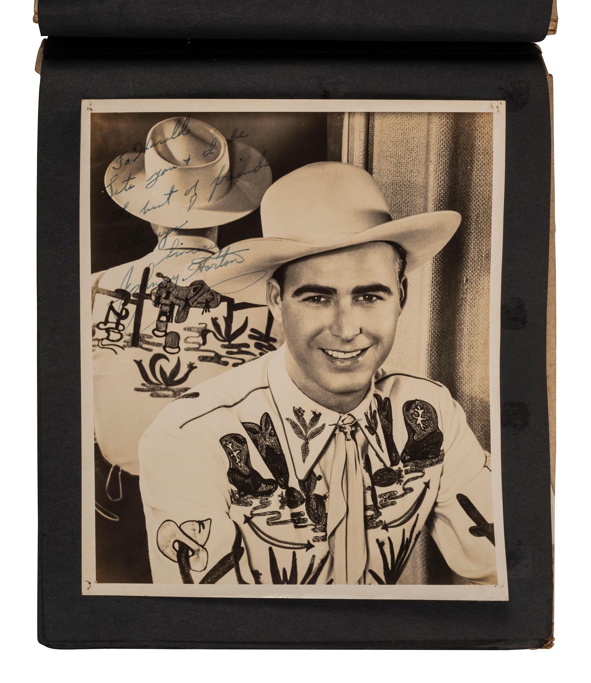 [COUNTRY MUSIC]. Traditional Country Music Hall of Fame scrapbook identified to Harold Sharp, containing rare Hank Williams Memorial Souvenir program.