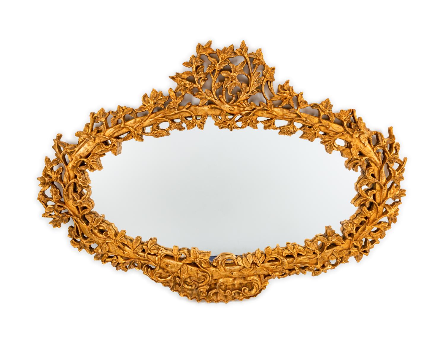 An Italian Rococo Style Carved Giltwood Oval Mirror