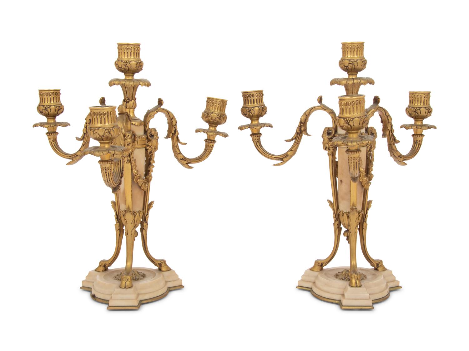A Pair of French Gilt Bronze and Alabaster Four-Light Candelabra