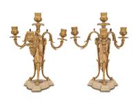 A Pair of French Gilt Bronze and Alabaster Four-Light Candelabra