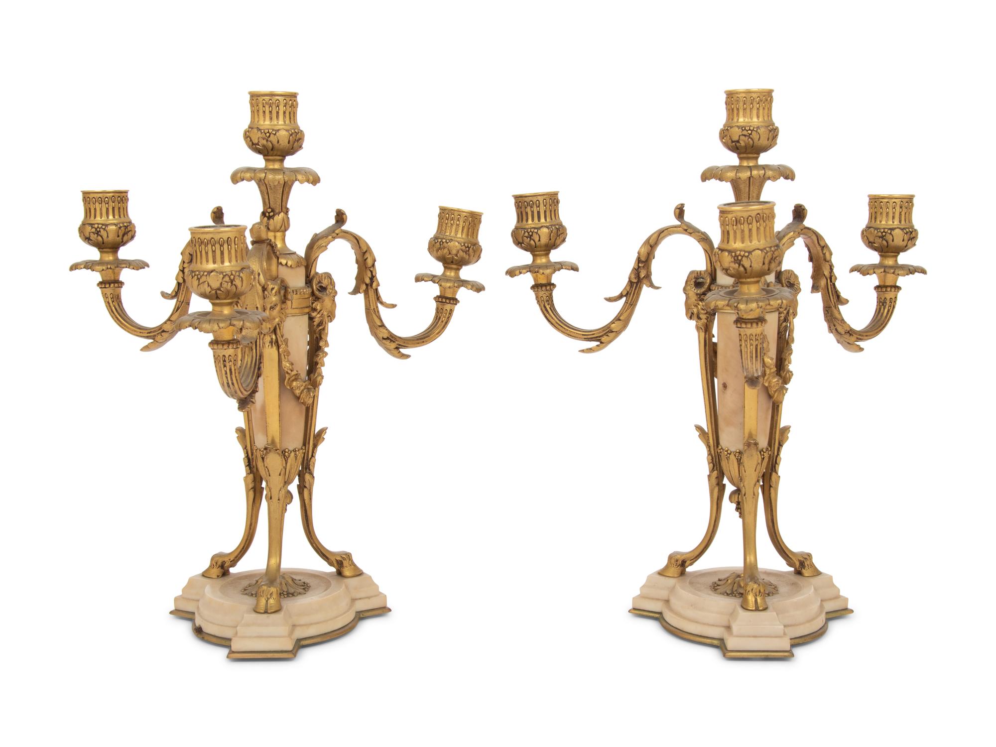 A Pair of French Gilt Bronze and Alabaster Four-Light Candelabra