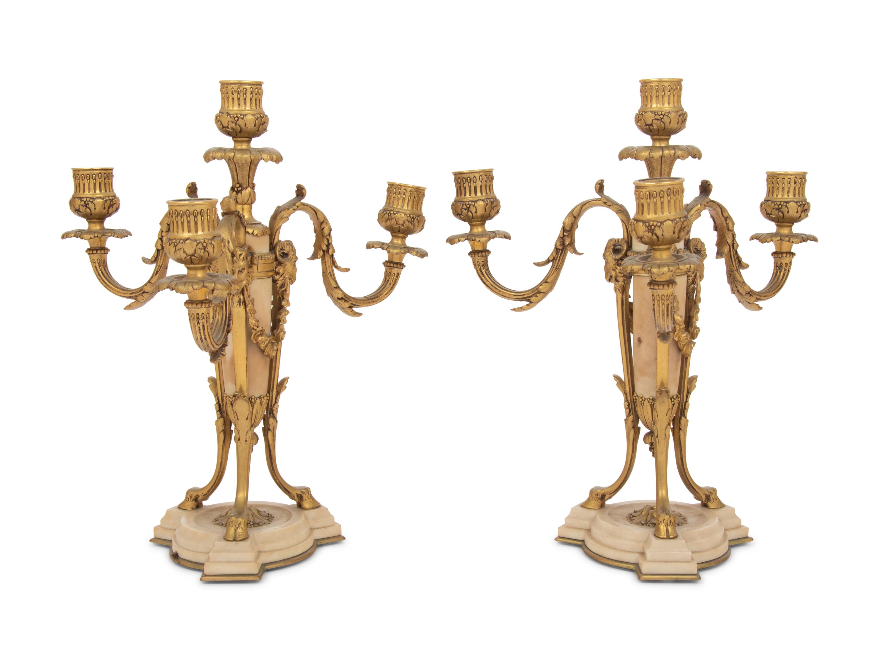 A Pair of French Gilt Bronze and Alabaster Four-Light Candelabra