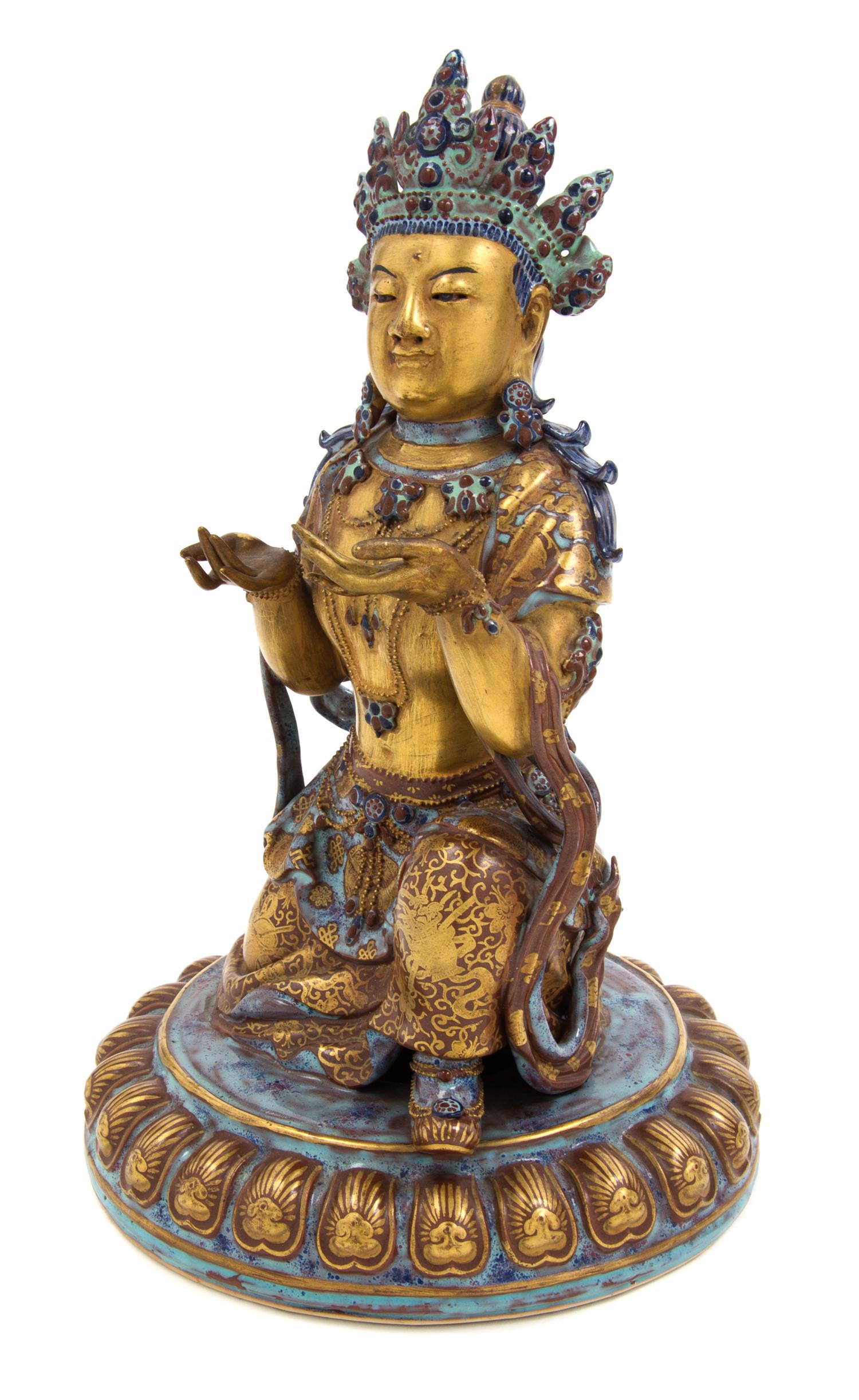 A Gilt Decorated Robin's Egg Glazed Porcelain Figure of Guanyin