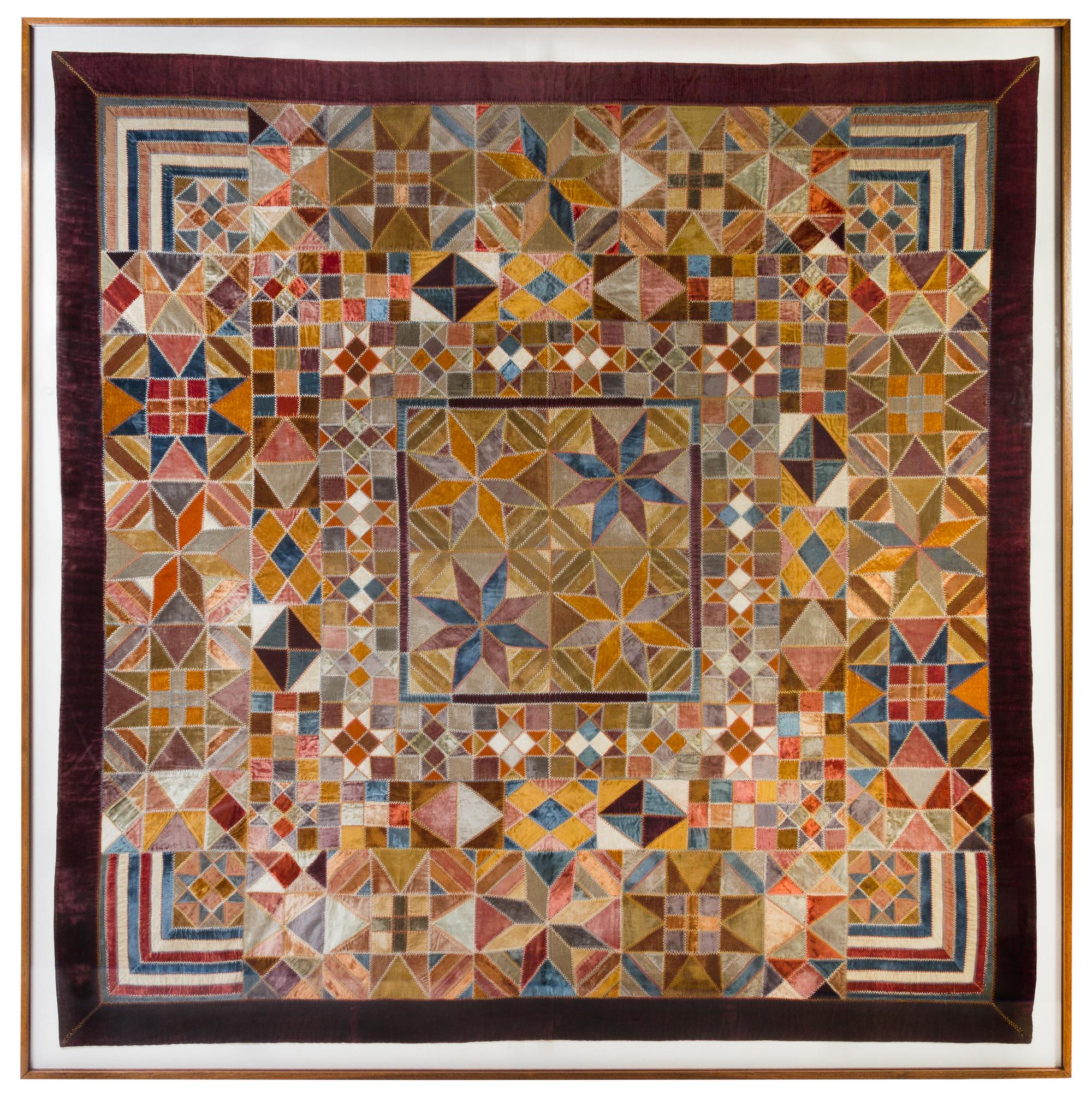 An American Silk and Velvet Patchwork Quilt Height 76 x width 86 inches. — LATE 19TH CENTURY