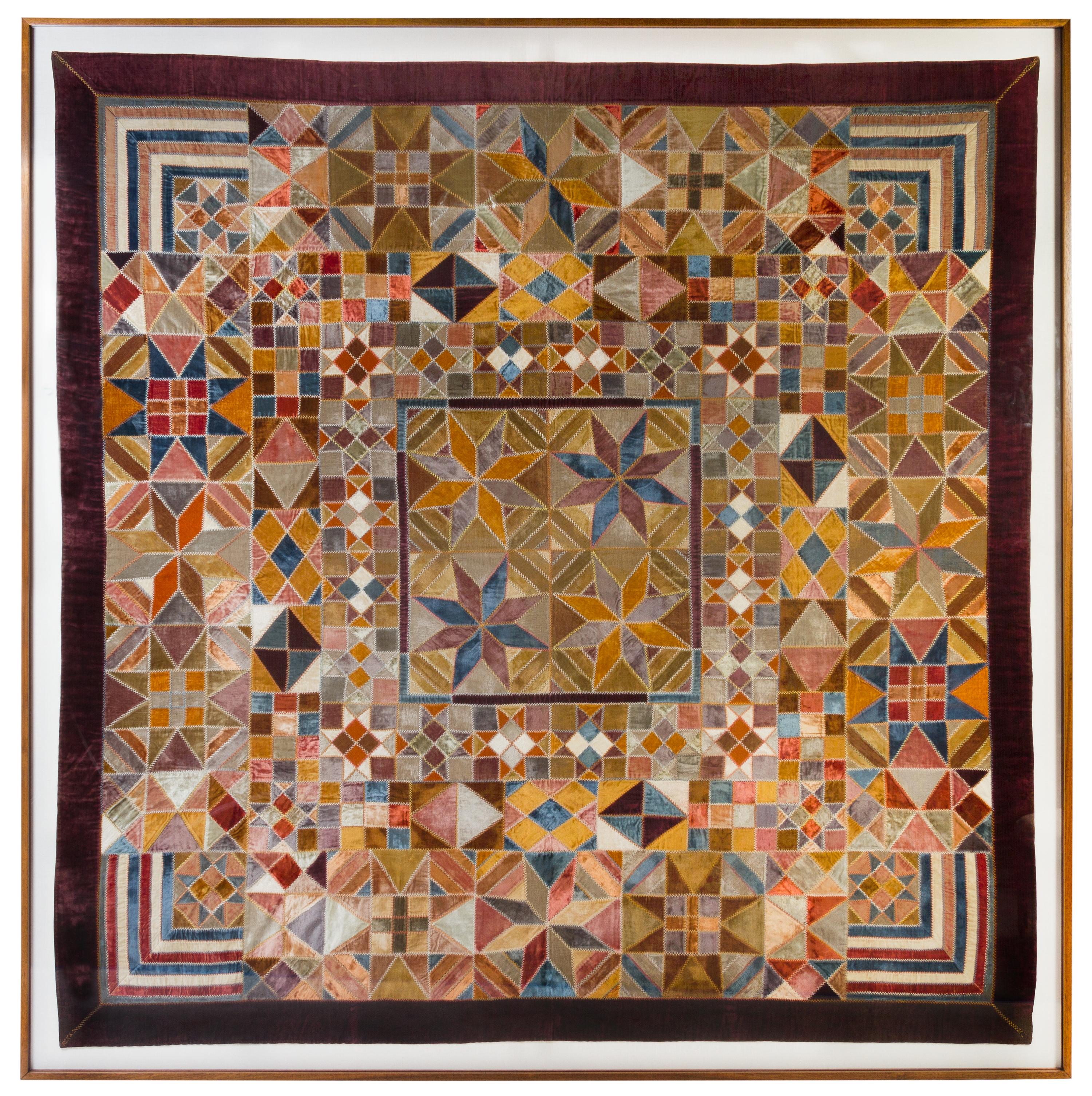 An American Silk and Velvet Patchwork Quilt Height 76 x width 86 inches. — LATE 19TH CENTURY