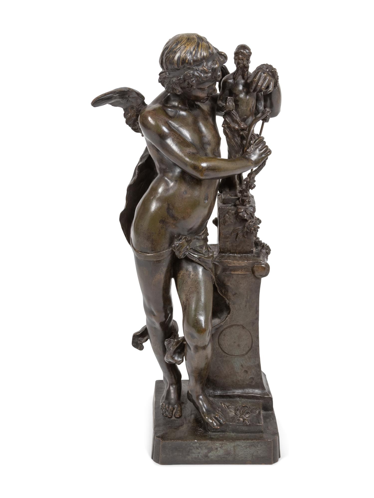 A Patinated Bronze of Cupid