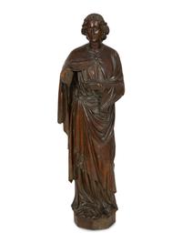 A Continental Carved Oak Figure of a Saint