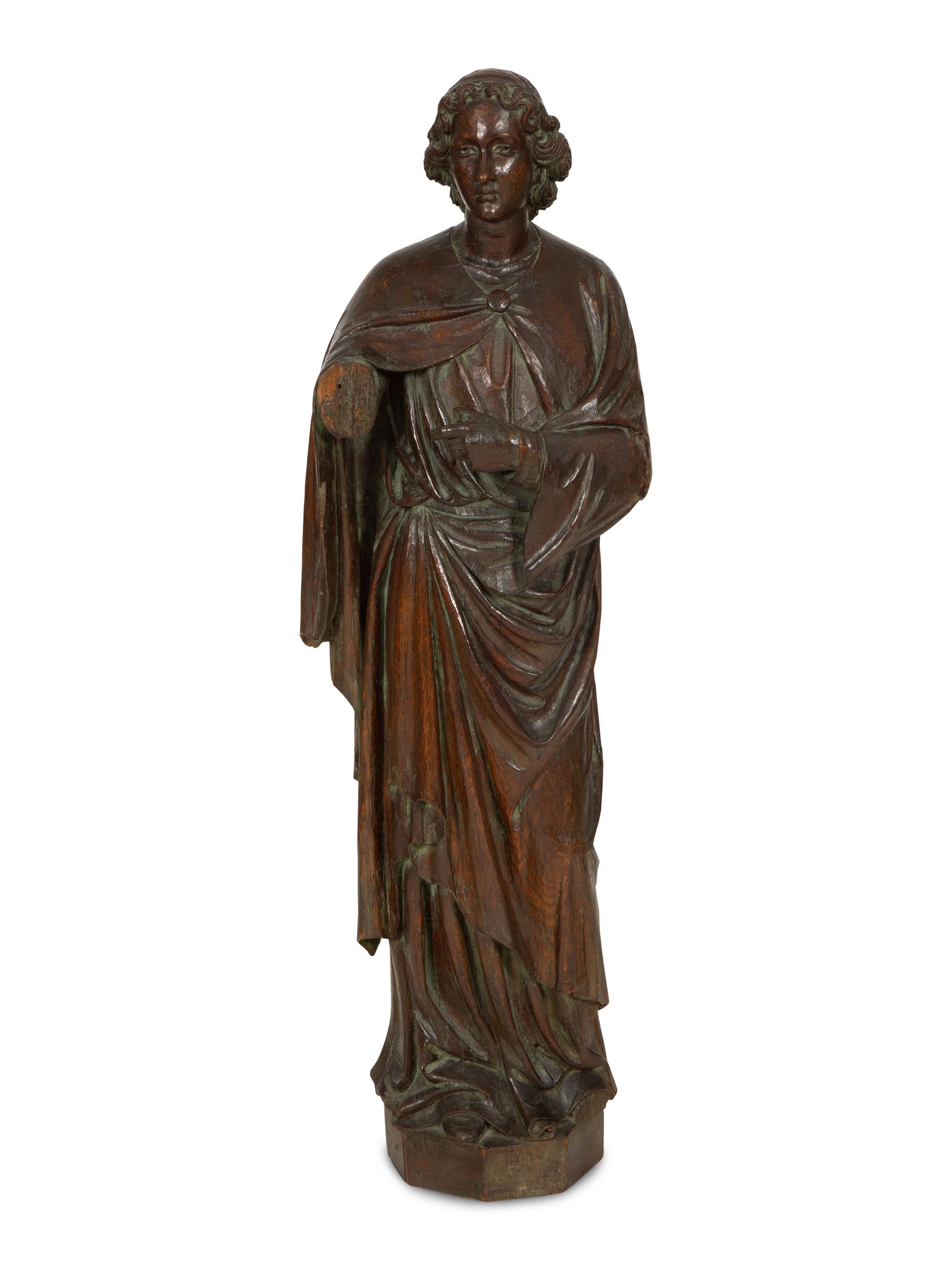 A Continental Carved Oak Figure of a Saint