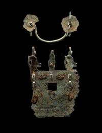 Two Etruscan Bronze Fragments from a Cista