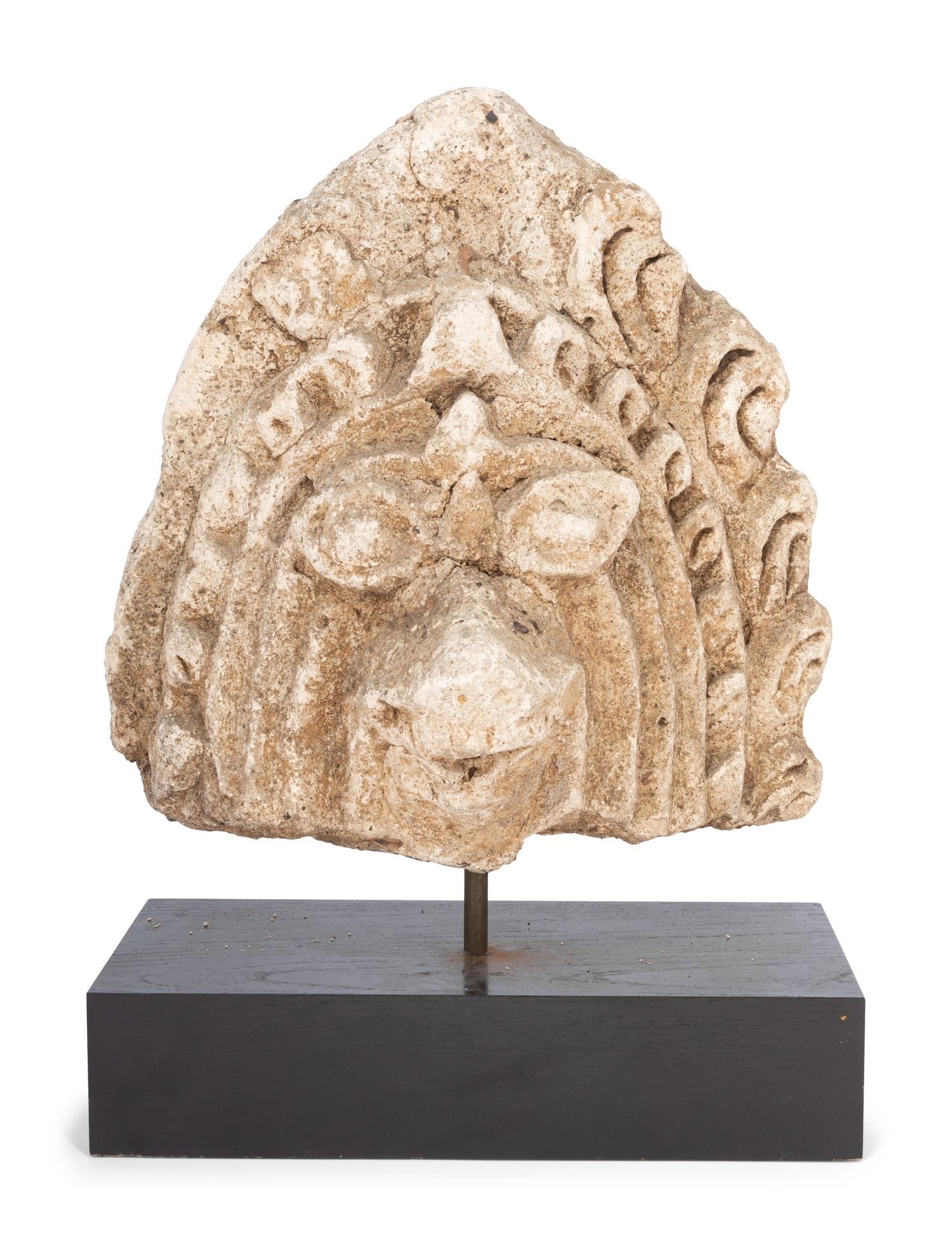 A Mexican Cast Stone Architectural Ornament on a Later Base
