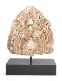 A Mexican Cast Stone Architectural Ornament on a Later Base
