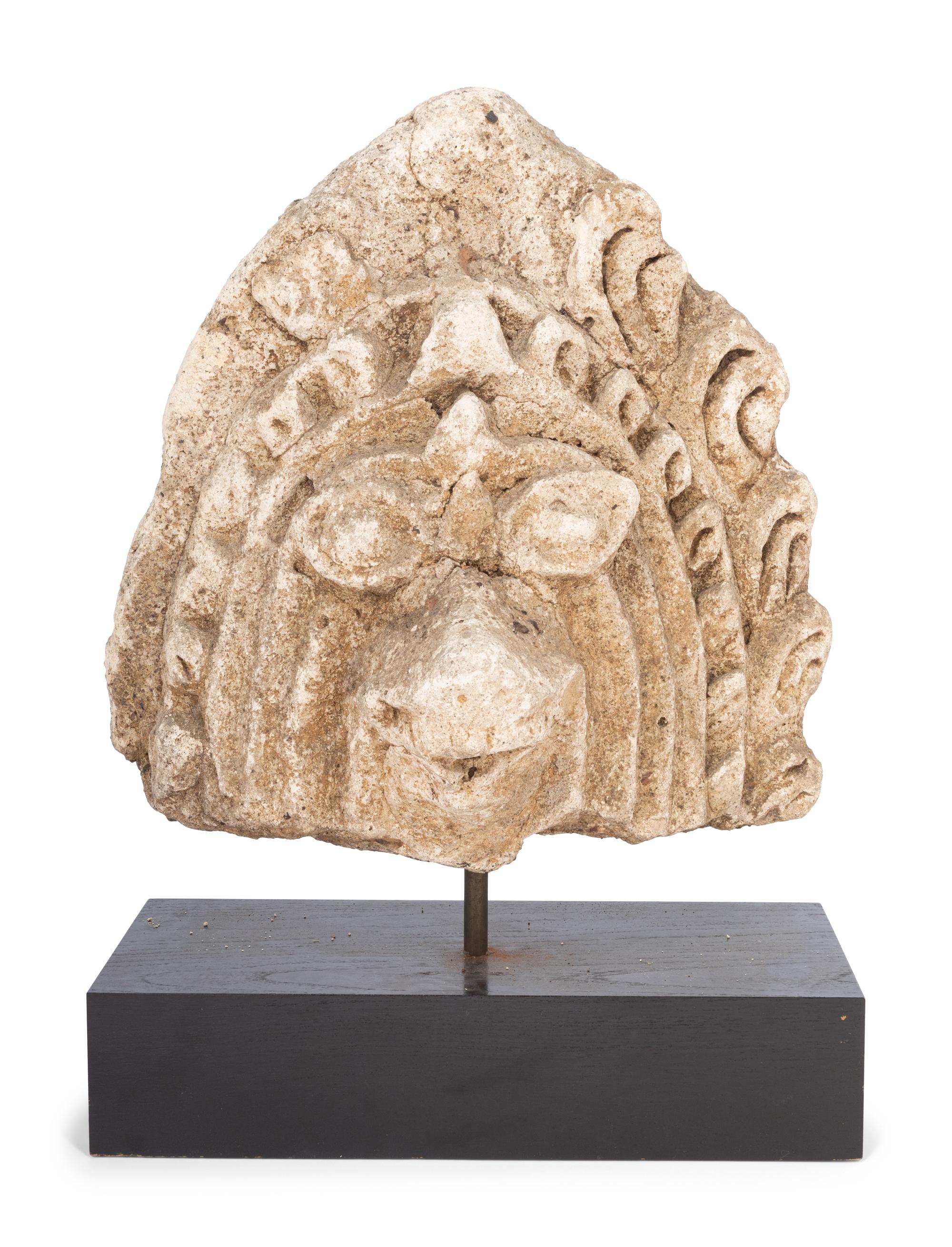 A Mexican Cast Stone Architectural Ornament on a Later Base