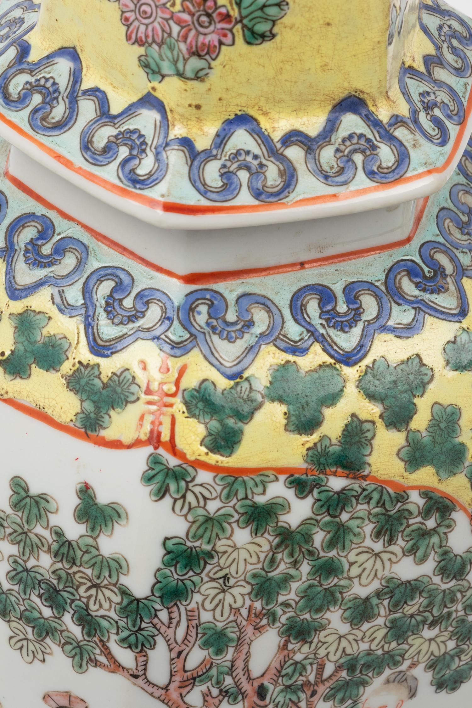 A Pair of Chinese Yellow Ground Famille Rose Hexagonal Vases and Covers