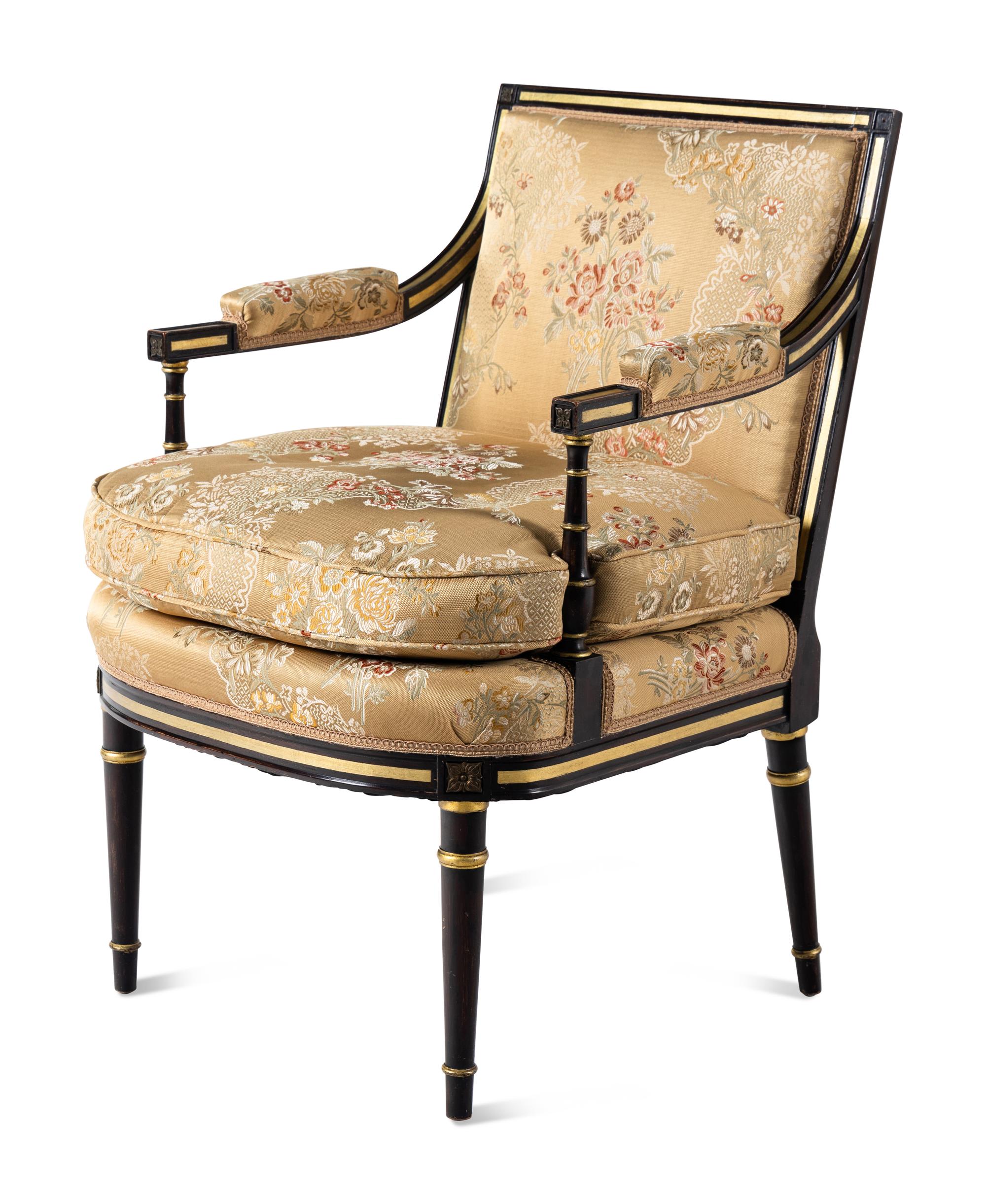 A Pair of Regency Style Painted and Parcel Gilt Armchairs
