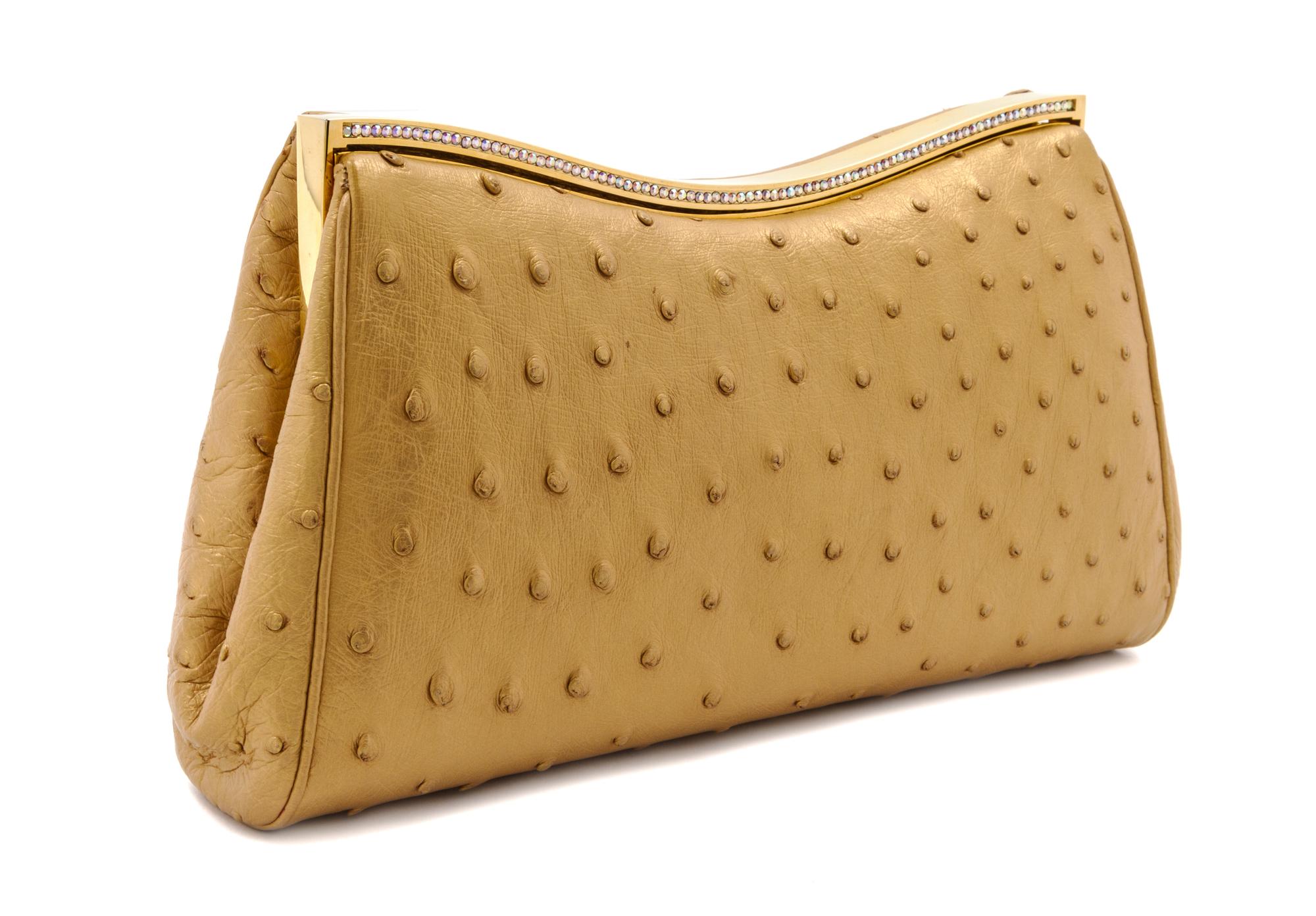 A Judith Leiber Metallic Gold Ostrich Evening Bag, 9 1/2 x 5 x 1 1/2 inches.
