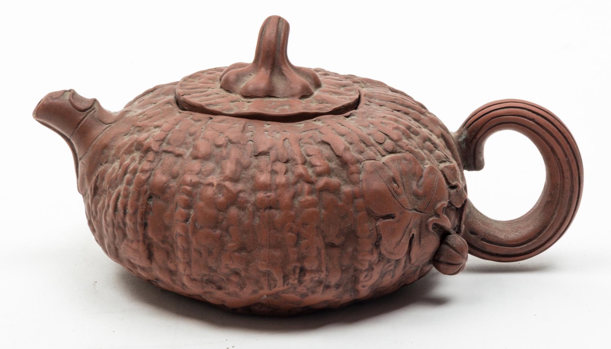A Large Yixing Pottery Teapot Diameter of teapot 7 inches.
