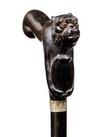 A Continental Carved Ebony Zoomorphic Walking Stick
