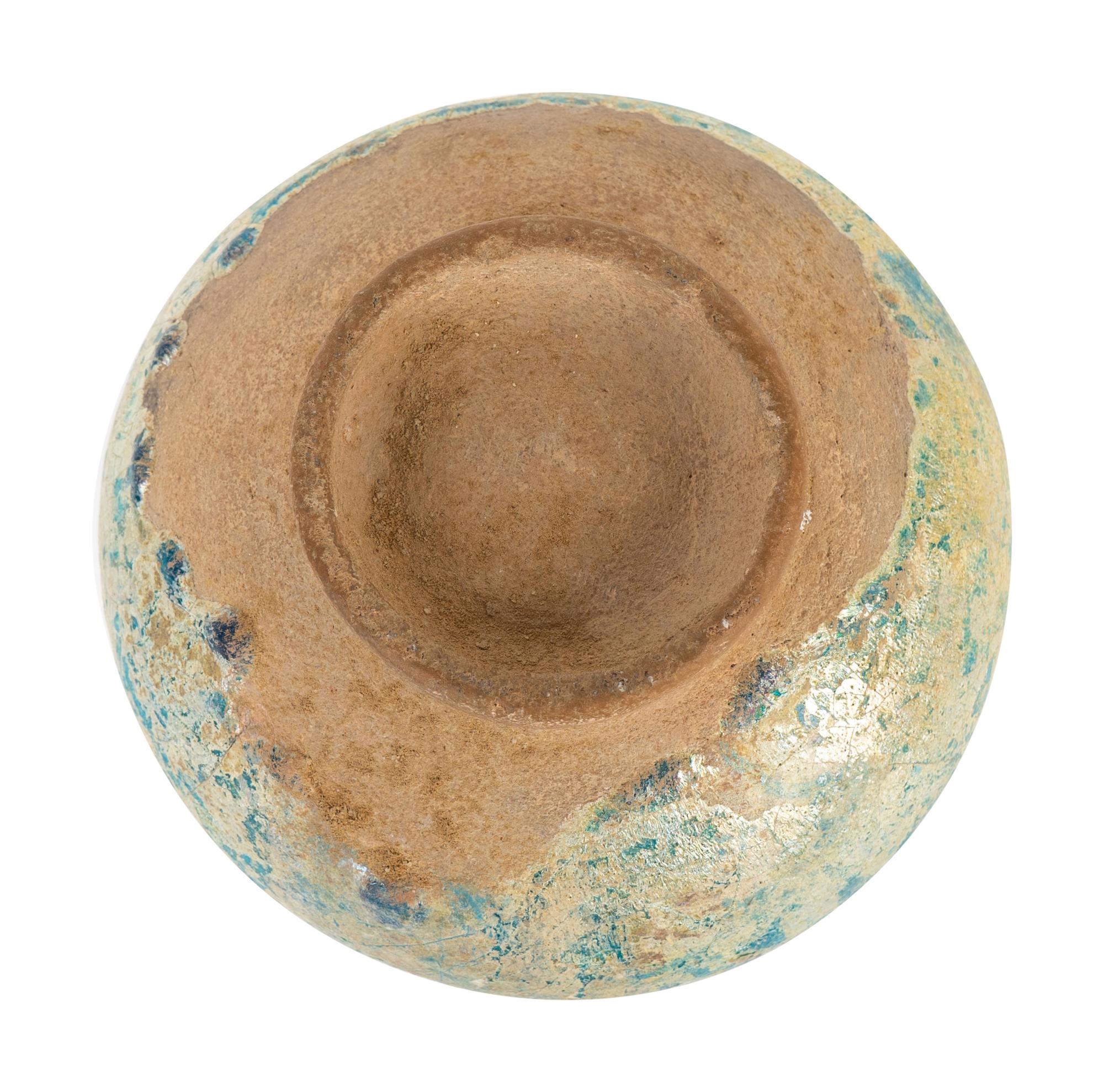 An Iridescent Glazed Earthenware Flask