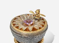 A group of five sterling silver, silver gilt, enamel, and semiprecious eggs, various makers, 20th century