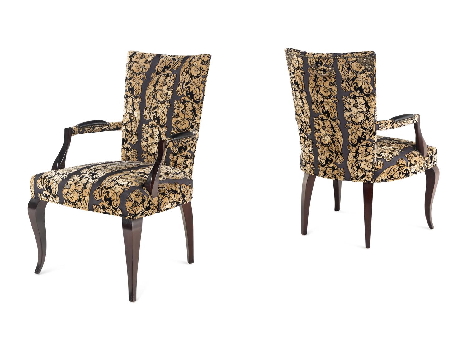 A Set of Four Upholstered Armchairs