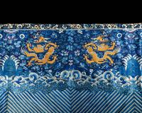 A Chinese Embroidered Silk 'Dragon' Panel, 19th Century — 清晚期 藍地龍紋綉片一幅