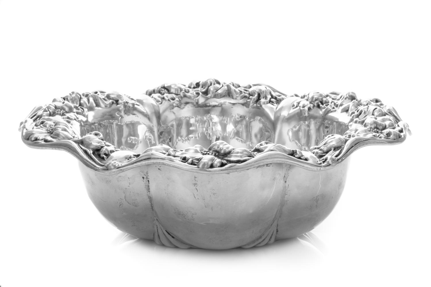 An American Silver Bowl, Unger Bros., Newark, NJ, the undulating border with repousse floral decoration above the lobed body.